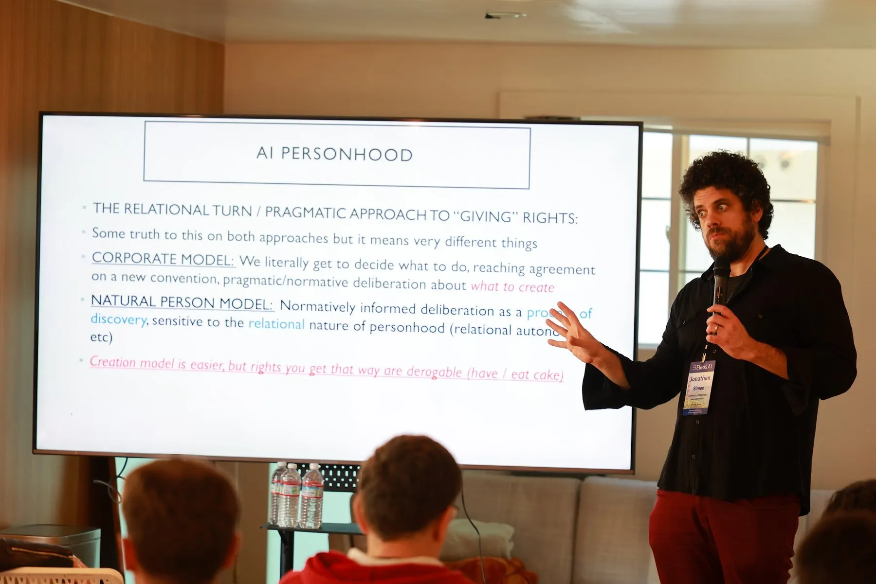 Jonathan Simon presenting a slide titled AI Personhood